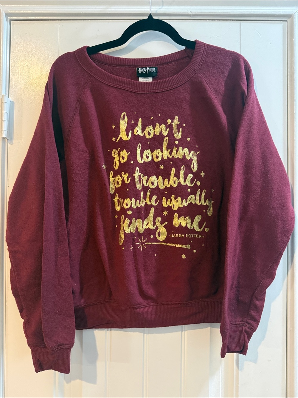 Harry Potter Women's Maroon Sweatshirt with Gold Foil “Trouble Finds me” Quote